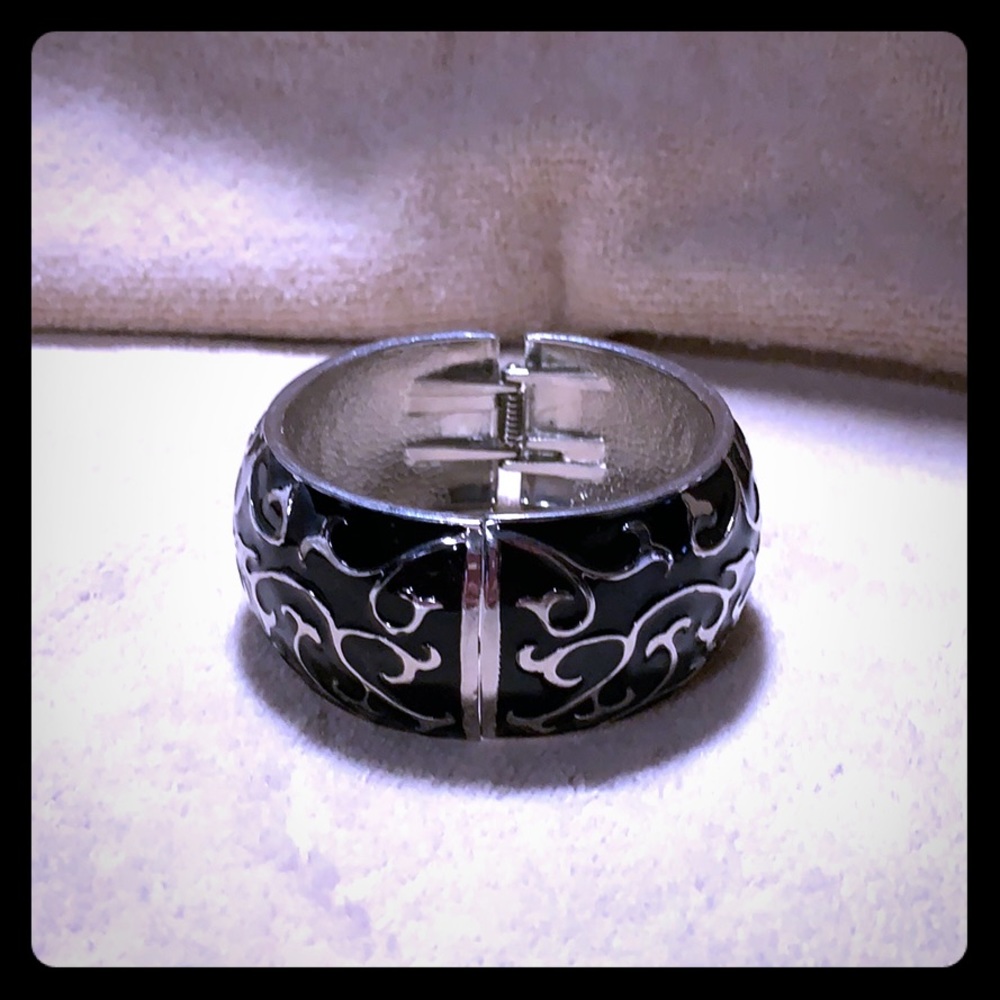 Silver and black metal bangle